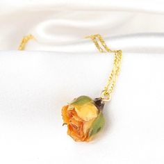 An everlasting durable jewelry with real roses: Because we treated these roses with resin, they are very durable and will not break easily. If the jewelry with roses is kept well by the owner, the jewelry can last forever. Thanks to the 925 sterling silver elements, the roses will become an heirloom that will never die.  ✓ Preserved Rose    ✓ Inspired by Nature  ✓ Bridesmaid Gift Saffron Yellow  Looking for something unique and different? Look no further than this wonderful saffron yellow rose b Rose Jewelry With Roses Detail As Gift For Her, Rose Gold Flower Jewelry For Keepsake, Rose-themed Jewelry As Gift For Her, Rose Flower Jewelry For Bridesmaid Gift, Dainty Rose Necklaces For Gifts, Dainty Rose Necklace As Gift, Dainty Rose Necklace For Gift, Flower-shaped Jewelry With Roses For Gift, Delicate Rose Design Jewelry Gift