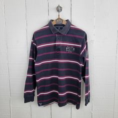 Vintage 1990's Rugby / Polo Shirt by Basefield, Black with Purple Stripes, Embroidered. Very good condition, 100% cotton, washed with care. Size: M Chest: 108 cm Length: 70 cm SHIPS TO MOST COUNTRIES WITH TRACKING NUMBER Long Sleeve Cotton Polo Shirt For Streetwear, Casual Long-sleeved Polo Shirt With Graphic Print, Casual Long Sleeve Polo Shirt With Graphic Print, Long Sleeve Cotton Polo Shirt For College, Cotton Long Sleeve Polo Shirt For College, Purple Polo Shirt, Rugby Polo, Black And Purple, Rugby Shirt