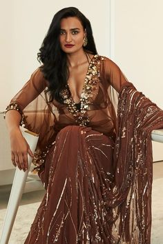 Chocolate brown kaftan with sequin applique, cutdana, bead embroidered border in floral pattern. - Aza Fashions Glamorous Georgette Dresses For Diwali, Glamorous Embroidered Georgette Set, Glamorous Georgette Dress With Zari Work, Glamorous Georgette Saree Dress, Glamorous Dresses With Dupatta For Festivals, Long Sleeve Embellished Kaftan For Diwali, Embellished Long Sleeve Kaftan For Diwali, Diwali Embellished Long Sleeve Kaftan, Glamorous Sheer Dupatta Dresses For Diwali