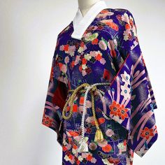 Welcome to my shop the vintage Japanese obi belt, kimono. One by one, made by hand, the only one of its kind in the world. This is an original Japanese vintage cotton Kimono in purple. It fits any size and is perfect for summer, as it is an unlined Hitoe Kimono. It is cleaned and in very good vintage condition. Details 👘 Good Vintage Condition cotton Length 130cm (51.18") Width 60 cm (23.6") One Size Why should you by from us? Our Kimonos have a history and a story to tell. They are original Japanese vintage and therefore of the finest quality and sustainable on top. We clean our kimonos to get rid of the dust and smell of the past and make them ready to wear. Because that's the way we would like to buy them! *The colours on your screen might differ slightly from the actual kimono colours Traditional Floral Print Kimono For Tea Ceremony, Floral Print Kimono For Tea Ceremony, Traditional Long Kimono With Floral Print, Traditional Long Floral Print Kimono, Bohemian Kimono With Kimono Sleeves For Tea Ceremony, Purple Floral Print Kimono With Kimono Sleeves, Japanese Obi Belt, Belt Kimono, Baby Kimono