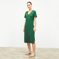 Made from the very best Peruvian pima cotton, the Renee dress features an easy fit, V neck, and side slits. Pair it with sneakers or slides for a relaxed look, or dress it up with some strappy sandals and a belt . Made in Peru with fabric from Peru. Green Fitted Dress With Split Hem, Fitted Green Dress With Split Hem, Green V-neck Relaxed Fit Midi Dress, Green V-neck Midi Dress With Relaxed Fit, Green Relaxed Fit V-neck Midi Dress, Casual Dresses With Side Slits And Split Hem, Casual Spring Midi Dress With Split Hem, Green Relaxed Fit Midi Dress For Work, Relaxed Fit Midi Dress With Side Slits