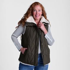 This Bernardo vest offers versatile styling with its reversible design, featuring chevron stitching on one side and plush Sherpa on the other. This hip-length vest boasts a classic fit, providing both comfort and a sleek silhouette. Perfect for adapting to any occasion, it gives you double the style choices given its reversibility. Sherpa Vest, Chevron Stitch, Reversible Vest, Chevron Quilt, Sherpa Lined, Hip Length, On Sale, Stitching, Sleek