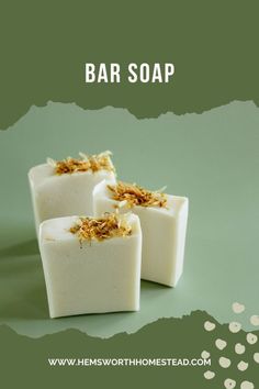 three bars of soap sitting next to each other on a green background with the words bar soap