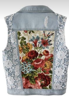 a jean jacket with flowers on it and lace around the back, is shown in white