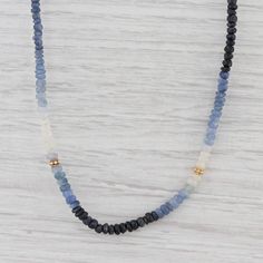 "This lovely new necklace is an authentic Nina Nguyen piece. This necklace has a retail price of $395. Gem: Natural Sapphire Beads Metal: Sterling Silver, 22k Gold Vermeil Weight: 23 Grams Stamps: Nina Nguyen 925 Style: Bead Strand Closure: Lobster Clasp Length: 32 - 36.5\" Adjustable Length Width: 3.7 mm Each piece is thoroughly examined and refinished as needed by our professional jewelers, graded by our in-house GIA (Gemological Institute of America) Graduate Gemologist, and inspected for qua Spiritual Everyday Necklace With Faceted Beads, Everyday Spiritual Necklace With Faceted Beads, Hand-strung Rondelle Necklaces For Gifts, Hand-strung Rondelle Necklace For Gift, Elegant Everyday Hand-strung Necklaces, Everyday Rondelle Faceted Beads Necklaces, Everyday Rondelle Faceted Beads Necklace, Everyday Rondelle Gemstone Beaded Necklaces, Everyday Rondelle Gemstone Beads Necklace