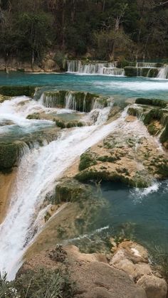 there is a waterfall that has water running down it