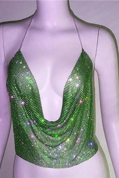 Sparkle in this handmade crop top adorned with shiny rhinestones. The dazzling design and cropped fit make it perfect for adding a touch of glamour to your look. Details: Elasticity: Non Stretch Fabric Type: Broadcloth Material: POLYESTER Size (IN) Bust Waist Length S 29.92-37.01 30.71-37.80 11.02 M 31.50-38.58 32.28-39.37 11.42 L 33.07-40.16 33.86-40.16 11.81 Glamorous Rhinestone Halter Top For Party, Glamorous Crop Top For Festival And Party Season, Green Backless Halter Top For Party, Rhinestone Crop Top For Club Parties, Rhinestone Crop Top For Club Party Season, Glamorous Rhinestones Crop Top For Party Season, Glamorous Club Crop Top With Rhinestones, Rhinestone Crop Top For Club And Party Season, Embellished Crop Top For Party Season