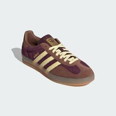 adidas Gazelle Indoor Shoes - Burgundy | Free Shipping with adiClub | adidas US Brown Adidas Low-top Sneakers, Brown Low-top Adidas Sneakers, Brown Adidas Sneakers With Logo, Brown Sneakers With Three Stripes And Round Toe, Brown Sneakers With Three Stripes Branding, Sporty Brown Sneakers With Three Stripes Branding, Sporty Brown Sneakers With Three Stripes, Brown Sporty Sneakers With Three Stripes, Brown Casual Sneakers With Three Stripes