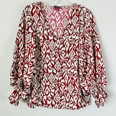 Vince Camuto Desert Summer Elegant Leopard Print Red Blouse Color: Red Cream Description:Pullover Cinched Wrist Ruffle Sleeve Fabric: Poly Approximate Across Measurement: Bust 20" Length 25" Sleeve 24" Great Condition Smoke Free Pet Free Storage Patterned V-neck Blouse For Work, Patterned V-neck Workwear Blouse, Viscose Tops With Blouson Long Sleeves, Red Printed V-neck Blouse, Red Long Sleeve Blouse With Blouson Sleeves, Red Blouse With Blouson Long Sleeves, Red V-neck Blouse For Fall, Elegant Red Top With Blouson Sleeves, Casual Viscose Tops With Blouson Sleeves