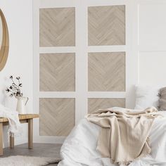 a bedroom with white walls and wood paneling