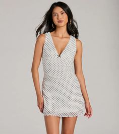 Show off the sweetest style on summer dates in this bow detail polka dot mini dress! Designed with an airy sheer mesh fabric with a knit lining for coverage, this mini-length dress is accented with an adorable polka dot pattern for the cutest vibe. It features a sleeveless V-neck and back design with a dainty eyelet trim, tank shoulder straps, a mini bow detail at the bust for a sweet touch, tie-back spaghetti straps, and a flirty flowy A-line silhouette. Pair with strappy mules.Fit & FeaturesPolka dot printed sheer mesh fabric with knit liningPlenty of stretchV-neck and back, tank shoulder strapsMini bow detail, eyelet trimTie-back strapsA-line fitRuns true to size Flirty Polka Dot Mini Dress For Summer, Feminine Polka Dot Mini Dress, Summer Chic Mesh Mini Dress, Chic Mesh Mini Dress For Summer, Fitted Swiss Dot Mini Dress, Flirty Polka Dot Mini Dress For Spring, Polka Dot Summer Mini Dress, Chic Polka Dot Mini Dress For Summer, Summer Polka Dot Mini Dress