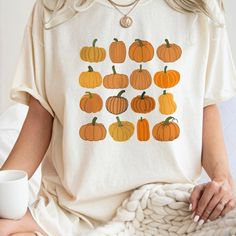 Pumpkin Shirt, Halloween Shirt, Fall Apparel, October Festive Shirt Discover Our Latest Range Of Versatile And Stylish T-Shirts (Gildan 5000), Where Style Harmonizes With Unparalleled Comfort! Featuring Sizes From S To 3xl And A Vibrant Spectrum Of Colors Such As Black, White, Sand, Green, Sport Grey, Red, Navy, And More, There's A Choice To Cater To Every Taste. Crafted With Precision Using Top-Notch Materials, Our T-Shirts Offer A Luxurious Sensation And An Impeccable Fit That Endures Througho Fall Apparel, Pumpkin Gift, Halloween Top, Festival Shirts, Pumpkin Colors, Pumpkin Shirt, Halloween Celebration, Thanksgiving Shirts, Fete Halloween