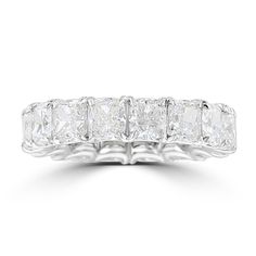 a white gold ring with five princess cut diamonds