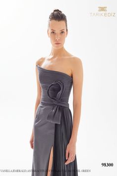 Looking for a chic and elegant dress for your next special occasion? Check out the Tarik Ediz 98300 Taffeta Spring 2023 evening collection dress. This gorgeous gown is made from luxurious taffeta fabric and features a flattering silhouette that is sure to make you look and feel your best. With its pretty detailing and timeless design, this dress is perfect for any formal event or black tie affair. Don't miss out on this must-have piece from Tarik Ediz! Strapless Evening Gowns, Plastic Dress, Tarik Ediz, Taffeta Fabric, Trumpet Skirt, Unique Prom Dresses, Strapless Neckline, Taffeta Dress, Short Lace Dress