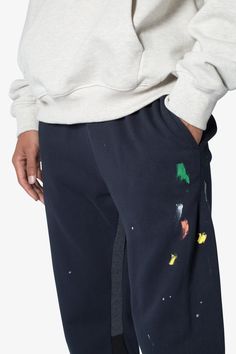 the Contrast Bootcut Sweatpants are designed with a relaxed fit throughout, featuring an elasticized self waist and leg opening, multi-colored paint splatter throughout, and finished with denim and contrasting panels at the inseam and outseam to provide a flare at the leg opening. details relaxed fit flared leg opening 55% cotton 45% polyester model is 6’1, 140 lbs and wears a size medium Bootcut Sweatpants, Pale Tan, 140 Lbs, Denim Cargo Pants, Fuzzy Cardigan, Denim Patches, Denim Flares, Paint Splatter, Grey Hoodie