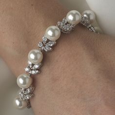 Affordable Elegance Bridal - Exquisite Ivory Pearl and CZ Bridal Wedding Bracelet, $79.99 (http://www.affordableelegancebridal.com/exquisite-ivory-pearl-and-cz-bridal-wedding-bracelet/) Silver Bridesmaid Jewelry, Mint Necklace, Unique Wedding Jewelry, Rings Ideas, Bride Jewelry, Bridal Fashion Jewelry, Southern Weddings, Wedding Jewelry Bracelets, Wedding Bridal Jewellery