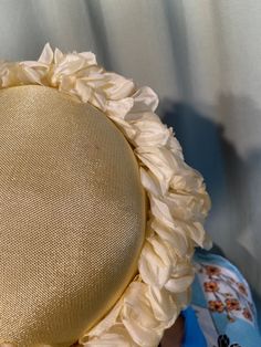 "This is a lovely, vintage hat from the 50s or early 60s. No labels or tags. No size tags. It measures 21\" around the inside. It is made of a stiff, sunny yellow form. The edge has a wide border of yellow fabric flowers, all around. The very edge of the hat is yellow velvet. The hat is in good, vintage condition. No damage or other issues. Small pin dot spot on top. No other soil or wear. So chic!" Vintage Cream Mini Hats With Curved Brim, Vintage Cream Mini Hat With Curved Brim, Vintage Cream Costume Hat With Curved Brim, Vintage Cream Mini Hat For Church, Vintage Cream Costume Hats And Headpieces For Events, Vintage Cream Hat Fascinator, Vintage Cream Hat For Vintage Events, Vintage Cream Fascinator Hat, Cream Vintage Hat For Vintage Events