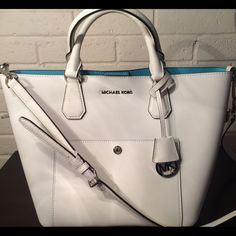 Price Firm!! Message Before Buying Brand New With Tags 100% Authentic Michael Kors Optic White Greenwich Satchel. All Bags Stored In Smoke Free And Pet Free Home. All Authenticity Tags Posted.. Serious Buyers Only I Been On Here For A While Now Too All My Loyal Customers You Should Know The Backdrop.. Measurements 16 X 6 X 13 Size Medium Designer White Shoulder Bag With Detachable Strap, White Satchel With Silver-tone Hardware For Errands, Designer White Satchel For Travel, White Satchel Bag For Errands, White Satchel Shoulder Bag With Handles, White Crossbody Travel Bag, Luxury White Satchel With Silver-tone Hardware, White Bags With Removable Pouch Double Handle, White Top Handle Bag With Silver-tone Hardware