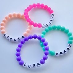 BACK IN STOCK! NOW AVAILABLE IN MORE COLORS - 31 COLORS to Choose from! NEWLY ADDED:  Color MIXES to choose from.  ( pink & purple mix - variation of beads used will be based on stock availability.  Kids Personalized Name Bracelet. You will receive (1) one bracelet  Made using Acrylic 8mm round Shiny opaque, matte translucent, bubble or matte beads, acrylic letter beads & durable 1mm elastic cord Personalized name bracelets make the perfect gift for your little one. Custom jewelry makes the perf Novelty Round Beads Bracelet For Birthday, Cute Blue Stretch Bracelet For Birthday, Novelty Bracelets With Letter Beads For Birthday, Novelty Birthday Bracelets With Letter Beads, Customized Playful Beaded Bracelets For Birthday, Casual Name Bracelet With Letter Beads For Birthday, Customizable Novelty Bracelets For Birthdays, Novelty Pink Stretch Bracelet For Birthday, Cute Friendship Bracelets With Round Beads For Birthday