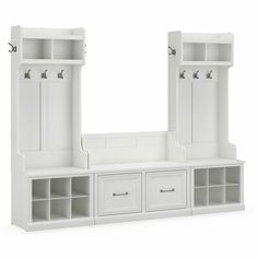 a white shelf with two open doors and drawers