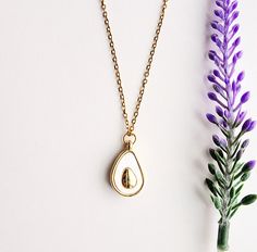 "Gold avocado charm necklace with 18\" stainless steel chain. This necklace is the perfect gift for girls or anyone who loves avocados.  How to order Just add to cart and purchase Handmade with love and care" Dainty White Necklace For Best Friend Gift, Stainless Steel Teardrop Pendant Jewelry For Gift, Stainless Steel Teardrop Pendant Jewelry Gift, Stainless Steel Teardrop Necklace For Gift, White Hypoallergenic Stainless Steel Necklace, Hypoallergenic White Stainless Steel Necklace, Nickel Free Teardrop Pendant Necklace For Gift, Nickel-free White Charm Necklaces For Gifts, Hypoallergenic White Jewelry For Best Friend