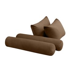 two brown pillows sitting on top of each other