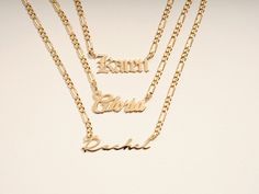 This 14k solid gold name necklace is made from a dainty, yet chic flat figaro chain. Its beautiful finish shines against your skin to accentuate your beauty. Don't forget to choose the best length that works for you! FEATURES • Material: 14k Solid Gold (Stamped 14K for authenticity) • Color Options: Yellow Gold • Chain Style: Flat Figaro Chain • Chain Width: 3.00 mm • Clasp Type: Lobster Clasp • Available Lengths: 14", 15", 16", 17", 18", 19", 20" For custom lengths feel free to contact us. We c Elegant Custom Nameplate Chain Necklace, Elegant Name Pendant Chain Necklace, Elegant Pendant Chain Necklace With Name, Elegant Personalized Yellow Gold Chain Necklace, Elegant Custom Name Chain Necklace, Figaro Chain Nameplate Jewelry For Anniversary, Personalized White Gold Elegant Chain Necklace, Elegant Personalized Curb Chain Jewelry, Elegant Gold Chain Necklace With Custom Name