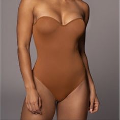 Nwt Jluxlabel Bustier Bodysuit In Mocha Size S Elegant Beige Shapewear For Summer, Stretch Bodysuit With Removable Bra Pads, Elegant Fitted Bandeau Bodysuit, Fitted Seamless Brown Shapewear, Fitted Beige Swimwear With Built-in Bra, Elegant Stretch Bandeau Bodysuit, Fitted Seamless Brown Bodysuit, Elegant Strapless Smoothing Bodysuit, Brown Fitted Bandeau Swimwear