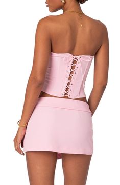 A structured top is complete with corset-inspired lacing up the back for a flirty finishing touch. Ties at back Strapless 95% polyester, 5% spandex Machine wash, dry flat Imported Chic Sleeveless Corset With Lace-up Back, Stretch Boned Bodice Corset For Club, Spring Party Corset With Boning, Club Corset With Sweetheart Neckline And Built-in Bra, Fitted Flirty Tube Top With Built-in Bra, Flirty Corset With Built-in Bra For Night Out, Backless Night Out Corset With Boned Bodice, Fitted Bandage Corset For Club Wear, Backless Summer Corset With Built-in Bra