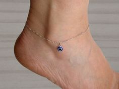 Sterling silver evil eye anklet bracelet. All components are 925 sterling silver. Available sizes:   8.30" + 2" extension chain (21 cm + 5 cm) 8.70" + 2" extension chain (22 cm + 5 cm) 9.10" + 2" extension chain (23 cm + 5 cm) Shipping: By Postal Service (no tracking). If you need tracking please choose another shipping option when you order it. You can see other models  https://www.etsy.com/es/shop/Malukart Anklets Evil Eye, Sterling Silver Anklets For Summer Gifting, Sterling Silver Anklets For Summer, Summer Jewelry Gift With Silver Chain, Sterling Silver Chain Anklet For Gift, Sterling Silver Anklet With Silver Chain For Gift, Sterling Silver Anklets With Silver Chain As Gift, Handmade Sterling Silver Anklets, Evil Eye Anklet