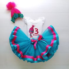 Every girl's the greatest wish is to look amazing! An adorable personalized outfit with a favorite character is always a good idea! Whenever it is a thematic party, birthday or even pleasure trip with family- be sure you sweetheart will always look awesome! 🎀 General information - The set includes a tutu skirt, t-shirt, and headband. Also, you can buy each item separately. - I make outfits both for the smallest, toddlers and older girls. If you don't find a needed size in the dropdown menu, please write me, I'm sure I can make it! - I use high-quality cotton bodysuits (3m-24m) and t-shirts (2t+) with short or long sleeves Personalization of your outfit Every item can be personalized in a way that is the most appropriate for your occasion- color scheme, print, accessories. Please, add this Fitted Princess Dress For Christmas Birthday, Cute Blue Party Sets, Fun Pink Party Sets, Cute Blue Sets For Birthday, Cute Blue Tutu Dress For Birthday, Cute Fitted Tutu Dress For Birthday, Fun Blue Dress For Birthday, Pink Princess Sets For Birthday, Pink Princess Birthday Sets