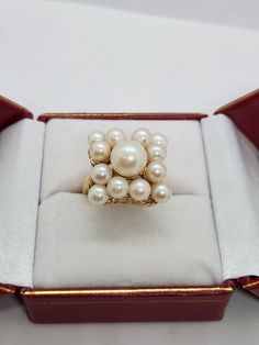 You are viewing a beautiful 14k solid gold white cluster pearl ring. The ring is marked 14k inside. The total weight of the ring is 10.70 grams  The ring size is 5 3/4  The ring itself measures approx. 19mm x 19mm wide. The  middle pearl measures approx. 8mm while the rest of the pearl measures approx. 5mm in diameter. Beautiful wave basket style intricate design on around the pearl...see photos. Good pre owned condition. Perfect gift for your loveones. Basket Style, Natural Jade, The Pearl, Intricate Design, Pearl Ring, Bracelet Gift, Rings Statement, Pearl Jewelry, Ring Gift