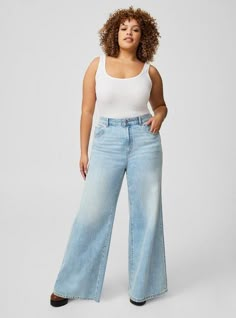 FIT High rise. Relaxed from hip to hem with wide leg with just the right amount of slouch. We recommend buying your true size for a slouchier fit. Size down for a closer fit. . Inseams: Short: 28. 5; Regular: 30. 5”; Tall: 32. 5”. MATERIALS + CARE Rigid+Stretch Denim: Best of both! Constructed with a rigid denim front and a stretchy denim back. Front of Jean Rigid Denim: Stretch-free for an authentic old-school look and feel. . Stretch Level: None. 100% cotton. Back & Waistband of Jean Vintage S Best Wide Leg Jeans, Plus Size Wide Leg Jeans, Wide Leg Jeans For Women, Plus Size Wide Leg, Denim Jeans For Women, Women's Plus Size Jeans, New Street Style, High Rise Wide Leg Jeans, Plus Size Denim