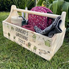 a garden tool box with gardening tools in it