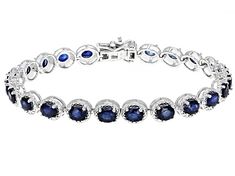 Pre-Owned 8.41ctw oval blue sapphire with .02ctw round white four diamond accents, rhodium over sterling silver bracelet. Measures approximately .27"W. Box clasp with double safety..  This product may be a customer return, vendor sample, or on-air display and is not in its originally manufactured condition.  It may not be new.  In some instances, these items are repackaged by JTV. Sapphire Tennis Bracelet With Round Diamonds, Sapphire Diamond Tennis Bracelet With Round Shape, Sapphire Diamond Tennis Bracelet With Round Cut, Classic Round Sapphire Diamond Bracelet, Round Sapphire Bracelet, Diamond Bracelets With Gemstone Accents, Formal Sapphire Round Bracelets, Formal Round Sapphire Bracelet, Sapphire Tennis Bracelet With 17 Jewels