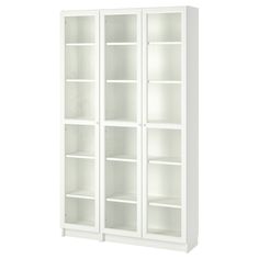 a white bookcase with three shelves on the front and two doors on the back