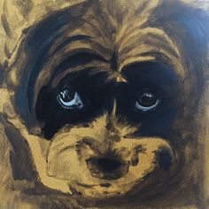 a painting of a dog's face is shown in black and gold tones with blue eyes