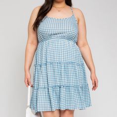 Picnic in the Park Gingham Strappy Dress in Blue PLUS This sleeveless (with crossed straps in the back!) dress is perfect for an impromptu afternoon picnic or a moonlit walk on the beach. 100% Rayon Casual Sundress With Adjustable Straps For Picnic, Blue Plaid Dress For Spring Picnic, Blue Plaid Dress For Summer Brunch, Plaid Sundress For Vacation, Picnic Sleeveless Plaid Sundress, Summer Sundress With Adjustable Straps For Picnic, Blue Plaid Dress For Summer Picnic, Casual Dress With Adjustable Straps For Picnic, Summer Plaid Sundress For Picnic