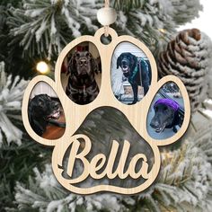 a wooden ornament with three photos of dogs on it and the word bela written below