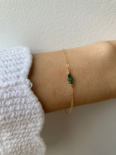 This little bracelet made with high quality materials makes a great gift. Emerald is also the birthstone of anyone born in the month of May. D E T A I L S  *It features high quality emerald rondelles  They are very nicely cut for maximum sparkle. *Choose between a 14k gold filled/rose gold filled chain or sterling silver chain. *Gold filled is a wonderful alternative to solid gold and unlike gold plating does not rub off. *It closes with a hallmarked spring clasp measuring 6mm. *Bracelet comes care instructions and a matching crystal information card and is ready for gifting. S I Z I N G * H E L P Choose the length from the drop down menu. Use the length guide as a reference. If unsure choose the extender option which will allow room for adjustment. C A R E * T I P Your  bracelet is dainty May Birthstone Crystal Bracelet Gift, Minimalist Hypoallergenic Crystal Bracelet For Everyday, Dainty Adjustable Birthstone Beaded Bracelets, Adjustable Minimalist Beaded Bracelets For May Birthstone, Minimalist Everyday Beaded Birthstone Bracelets, Hypoallergenic Emerald Bracelet Jewelry, Dainty Tiny May Birthstone Jewelry, Hypoallergenic May Birthstone Bracelets For Birthday, Gemstone Chain Bracelet Gift