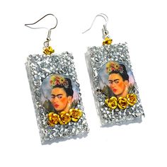 Frida Kahlo Handcrafted Earrings 2 3/4 Inches Dangle Earrings With Bling For Gift, Bling Dangle Earrings For Gift, Metal Crystal Earrings With Bling For Gift, Nickel Free Artistic Jewelry For Parties, Artistic Nickel-free Jewelry For Parties, Nickel-free Artistic Jewelry For Parties, Nickel Free Artistic Party Jewelry, Silver Dangle Jewelry With Bling, Adjustable Nickel-free Silver Crystal Earrings