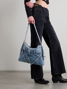 It doesn't matter the style or shape - every bag in Givenchy's 'Voyou' collection is framed by the signature buckled straps. This slouchy 'Boyfriend' version is made from panels of denim and has an adjustable top handle with crystal-embellished hardware. The medium-sized interior offers more than enough space for the essentials (think phone, wallet and sunglasses) plus a tablet and cosmetics case, too. Denim Shoulder Bag, Matching Separates, Givenchy Women, Denim Shoulder Bags, Embellished Denim, Sport Swimwear, Jo Malone London, Doesn't Matter, Knitwear Tops