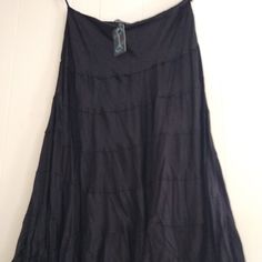 Bohemian Cafe Black Skirt Size 18 Womans Waist 38 Inches From Waist To Hem 38 Inches 8" Zipper On Side Of Skirt 50 % Rayon - 50 % Viscose Brand New Never Worn Black Bohemian Maxi Skirt For Summer, Black Bohemian Maxi Skirt For Festival, Bohemian Black Maxi Skirt For Festival, Black Bohemian Long Skirt, Black Bohemian Summer Skirt, Black Bohemian Maxi Skirt For Vacation, Black Tiered Skirt For Festival, Black Tiered Maxi Skirt For Beach, Black Flared Maxi Skirt For Vacation