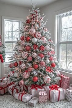 a christmas tree decorated with red and white ornaments