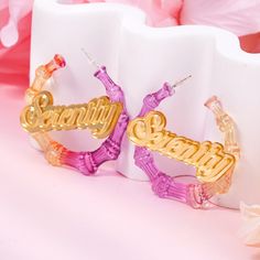 Item: 2023EA0051 Material: Acrylic Color: Blue&Pink,Pink&Orange,Black&Green,Brown,Black&White,Brown&White Process:  Gold Plated Recipient: Woman, Mom, Wife, Girl Friend, Children, Family Product Type: Personalized Jewelry Gift Type: Earrings Occasions: Valentine's Day, Mother's Day, Christmas, Birthday, etc Earrings Type: Name Earrings Brand: Silviax Jewelry Trendy Pink Jewelry For Birthday, Trendy Pink Hoop Earrings As Gift, Trendy Pink Hoop Earrings For Summer, Pink Hoop Earrings For Party, Trendy Colorful Hoop Earrings For Party, Trendy Colorful Party Hoop Earrings, Trendy Personalized Earrings For Party, Personalized Pink Earrings For Party, Pink Personalized Party Earrings