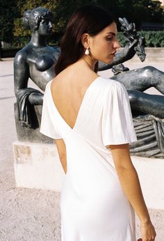 Ciao Lucia Brunello Dress Ivory Elegant Short Sleeve V-neck Dress For Brunch, Elegant White V-neck Dress With Ruffles, White V-neck Summer Formal Dress, White V-neck Dress For Summer Formal, White V-neck Dress For Formal Summer Events, White Formal V-neck Dress For Summer, Elegant Summer Maxi Dress With Butterfly Sleeves, White Fitted V-neck Short Sleeve Dress, White Fitted V-neck Dress With Short Sleeves