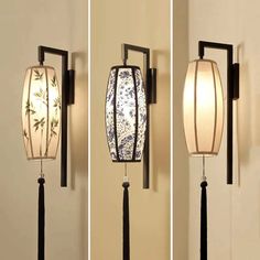 three different types of wall lights with flowers on the lampshades and behind them