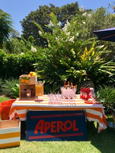 the table is set up for an aperol party