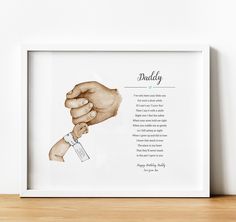 a hand holding a knife with the words daddy written on it in black and white