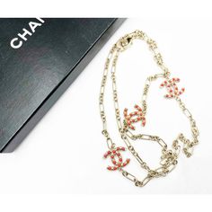 Chanel Gold CC Red Bead Chain Necklace  *Marked 08 *Made in Italy *Comes with original box  -Approximately 40″ long total -Pendants are approximately 1″ x 1″. -Wrap around double or wear as a long necklace. -In an excellent condition.  AB8008-00179  Please see the measurements section for best approximate dimensions. Designer Chain Necklace As Gift, Elegant Red Beaded Chain Necklace, Red Long Necklace With Adjustable Chain, Luxury Red Necklaces, Elegant Red Long Necklace For Gift, Designer Red Jewelry Gift, Designer Red Jewelry As Gift, Designer Red Jewelry For Gift, Luxury Beaded Chain Necklace As Gift